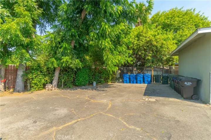 Trash can area and more parking spaces