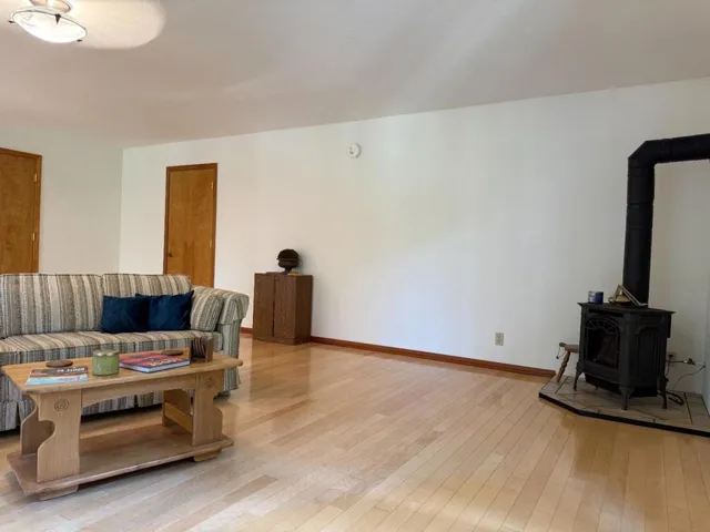 The upstairs lounge with stove can be used as another bedroom, a game room, work from home area, etc