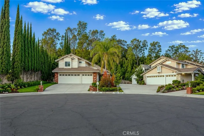 Quietly tucked at the end of a West Hills cul-de-sac, this nearly 2,000 sq. ft. home feels bright, welcoming, and instantly comfortable from the moment you walk through the door. The front yard is landscaped with colorful flowerbeds, mature succulents, cactus, a rose hedge, and a covered front porch perfect for morning coffee or relaxing evenings.