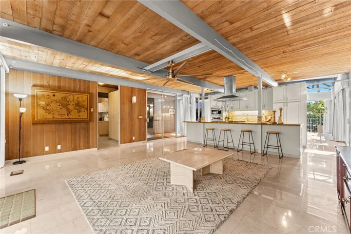 Spacious living room opens to the kitchen