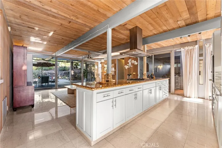 Living room opens to the ginormous backyard