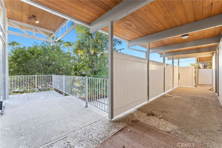 The right leads to the spa tub off the primary bedroom. The left leads to the balcony/patio off the formal sitting area