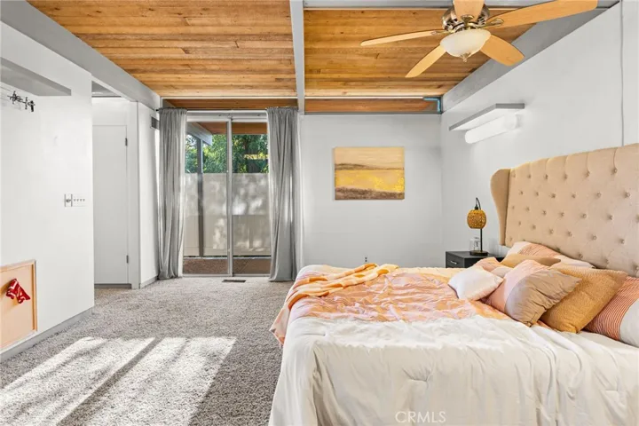 This sliding glass door leads to the private spa tub