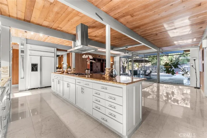 Separate stove top opens to the living room