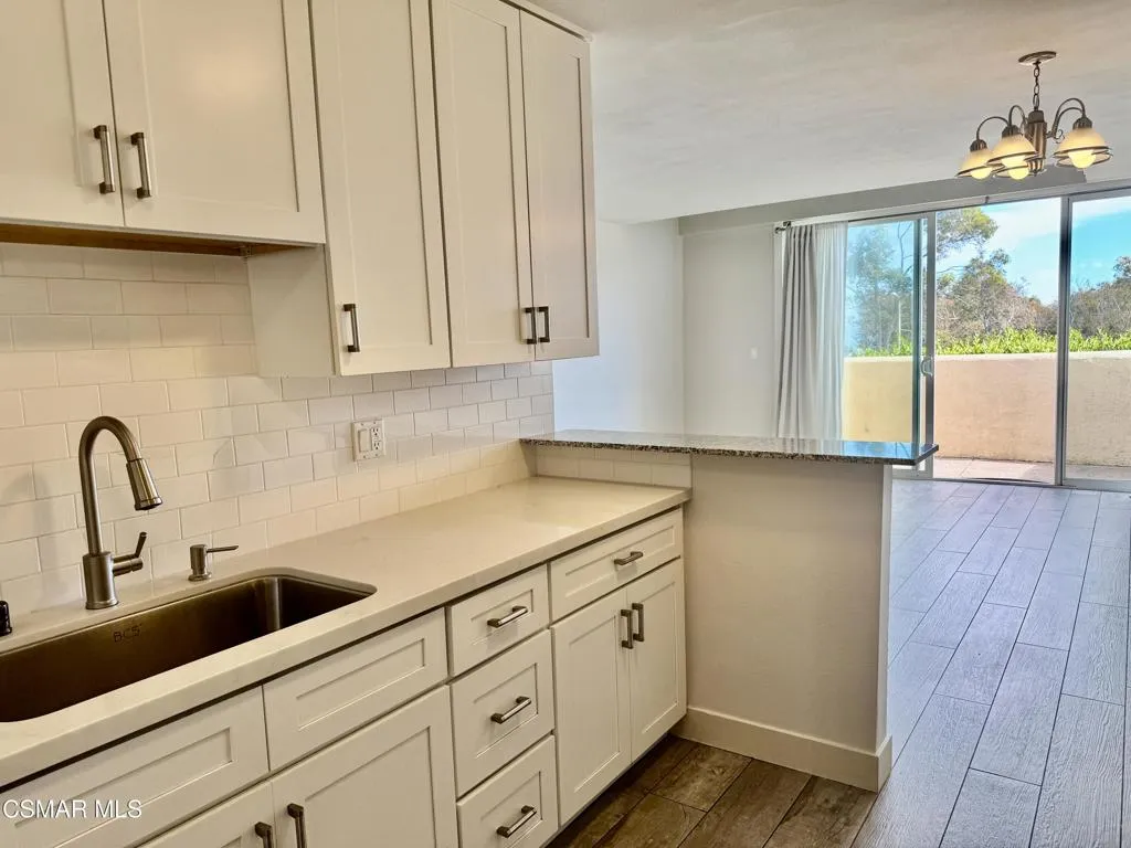 Kitchen Opens to Living Room and Views