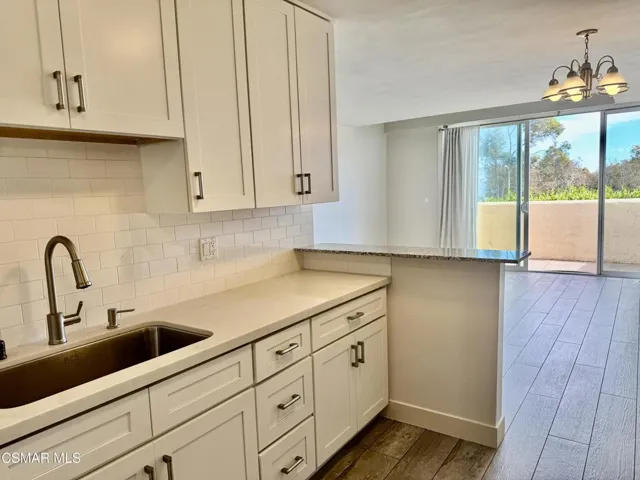Kitchen Opens to Living Room and Views