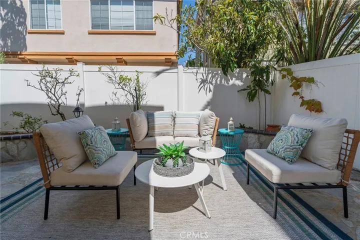 Nice back patio area with garden bed