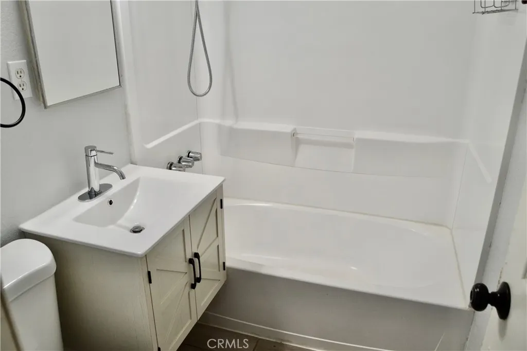Bathroom at the end of the hallway.