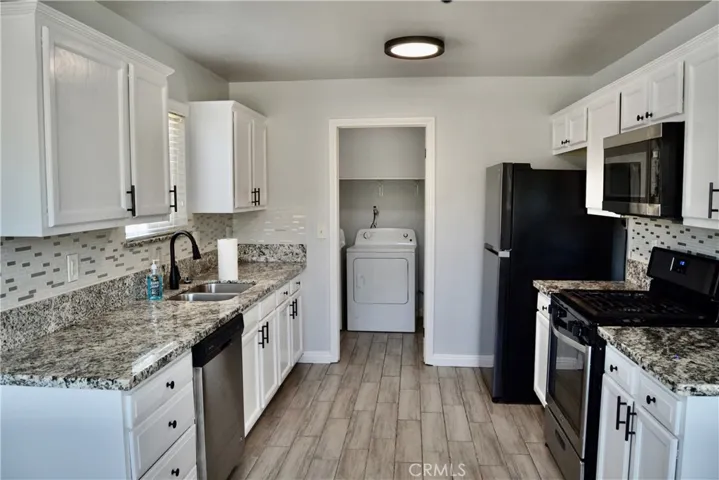Standing in the dining area looking to the laundry room.