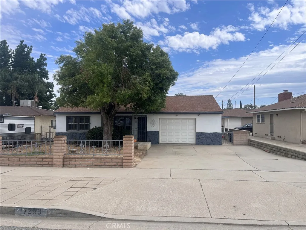 View from Miller Ave, one car attached garage and driveway fits 4 vehicles comfortably