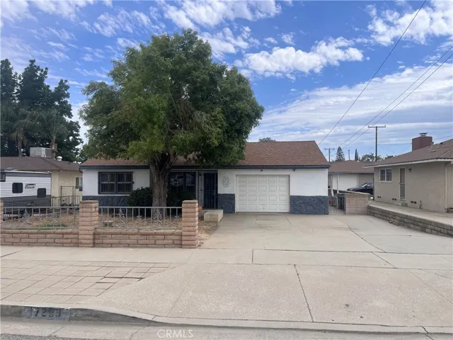 View from Miller Ave, one car attached garage and driveway fits 4 vehicles comfortably