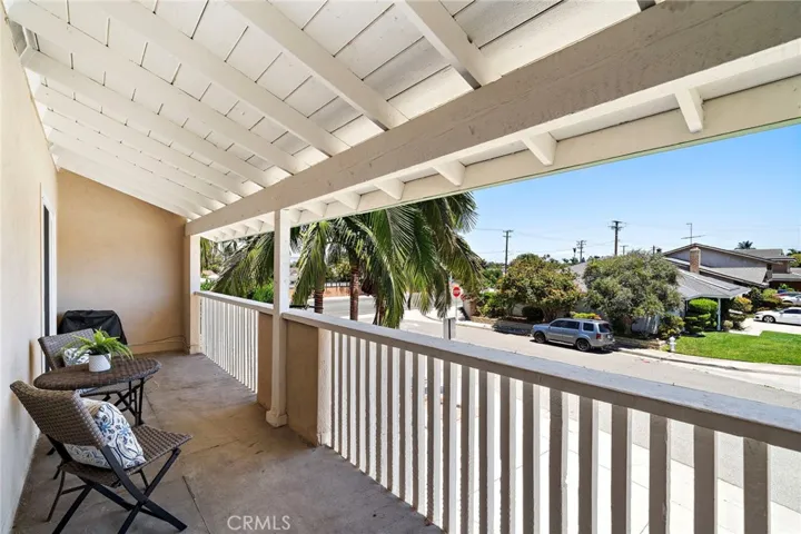 large balcony located off two upstairs bedrooms
