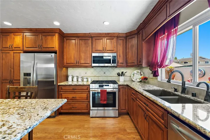 a built-in microwave, five-burner range
