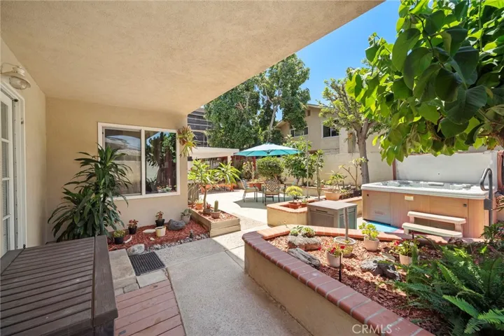 door leads to downstairs bedroom and backyard close to the spa