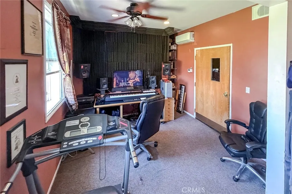 Third car garage being used as a studio