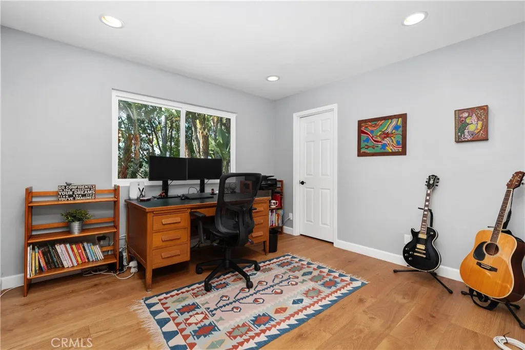 Bedroom 1 being used as a office with walk in closet.