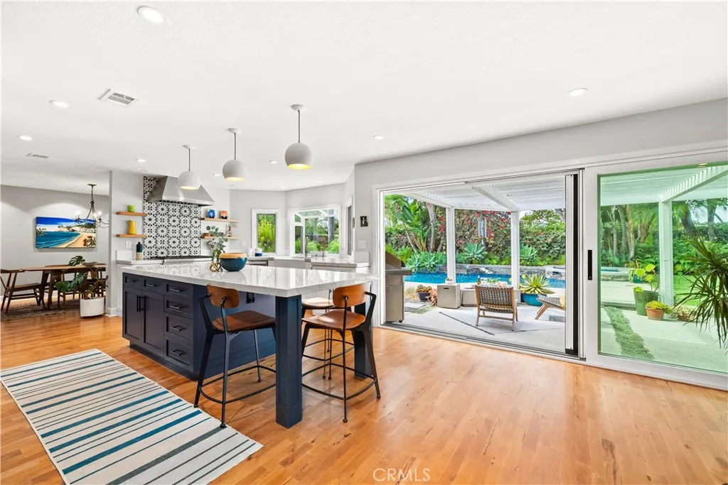 Show stopper kitchen and family room area, all that leads to a equally stunning backyard space!