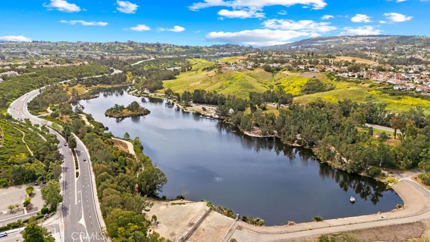 Laguna Niguel Lake is a place to hike, walk, play pickleball, picnic tables and playground plus fish!