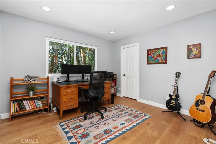 Bedroom 1 being used as a office with walk in closet.