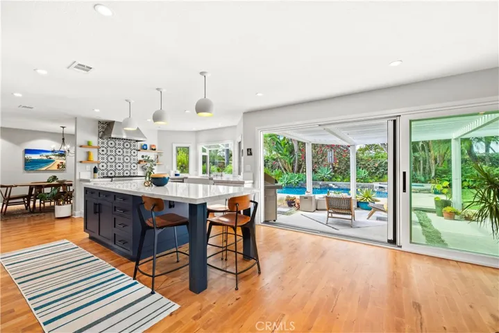 Show stopper kitchen and family room area, all that leads to a equally stunning backyard space!