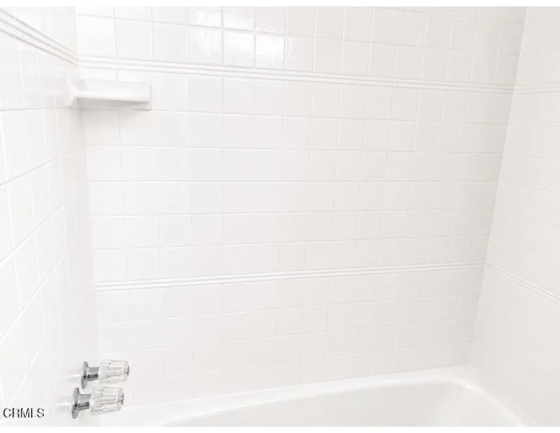 bathroom with white tile