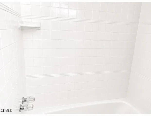 bathroom with white tile