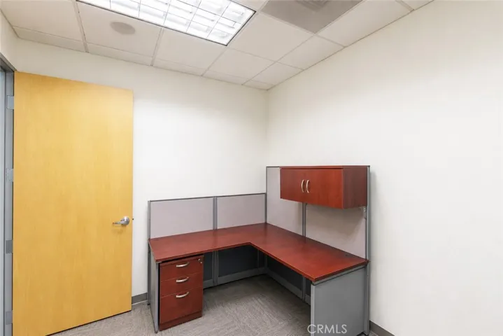 AI post-processed to remove personal belongings and furnishings.