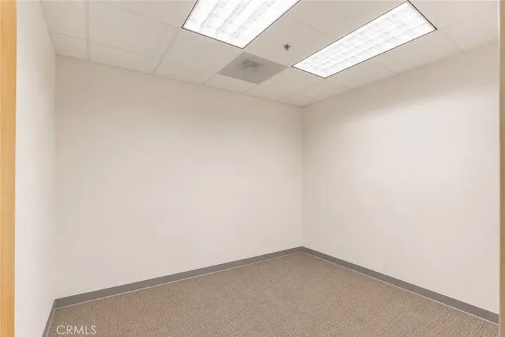 AI post-processed to remove personal belongings and furnishings.