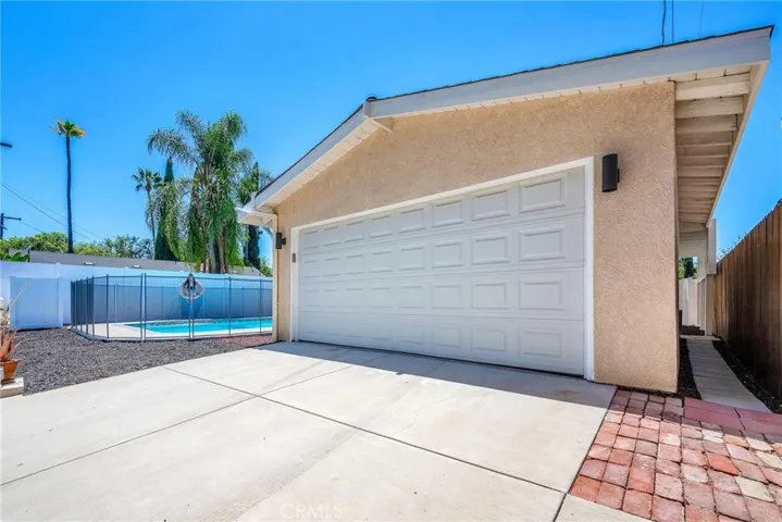 Gated Garage with access from the rear Alley.