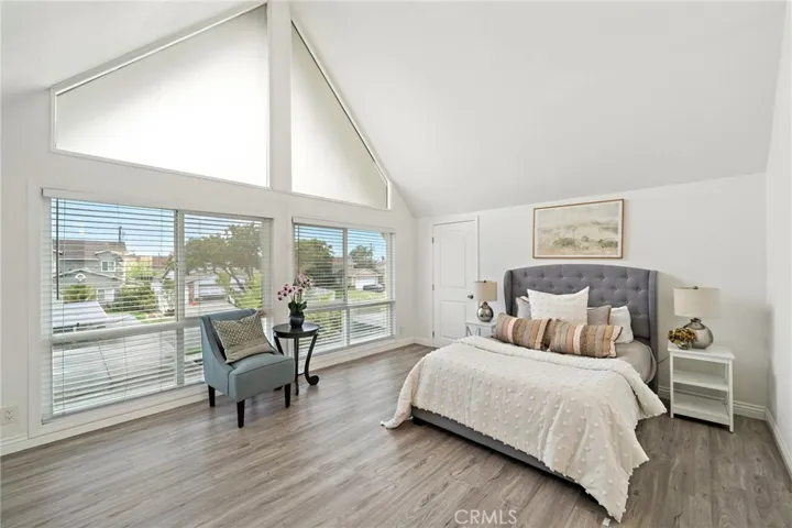 Bedroom #4 Upstairs with Soaring Cathedral ceilings and enormous greenhouse-style windows
