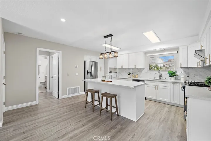 The "Heart" of this Home is this Remodeled Chef's Dream Quartz Kitchen!
