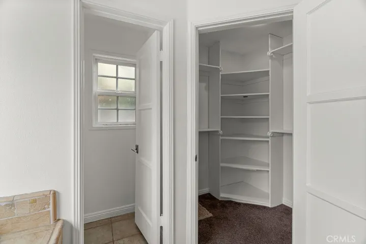 MAIN PRIMARY ENSUITE BATHROOM & WALK-IN CLOSET