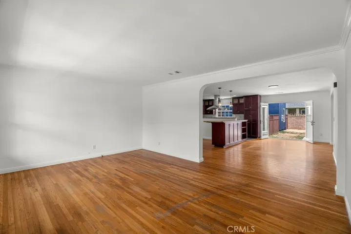 MAIN LIVING ROOM INTO DINING ROOM & KITCHEN