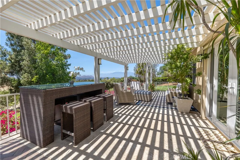 Wonderful Large Gated Patio Area off your Family Room with Newer Alumawood Covering.