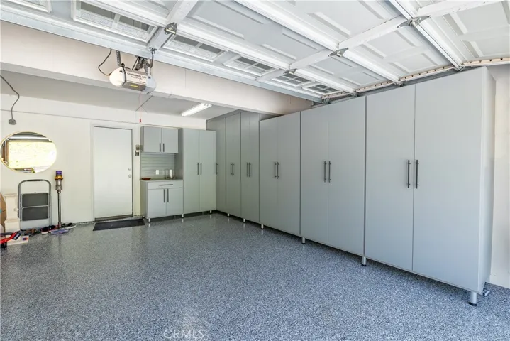 Finished 3 Car Garage with Custom Closet World Cabinets! Perfect!