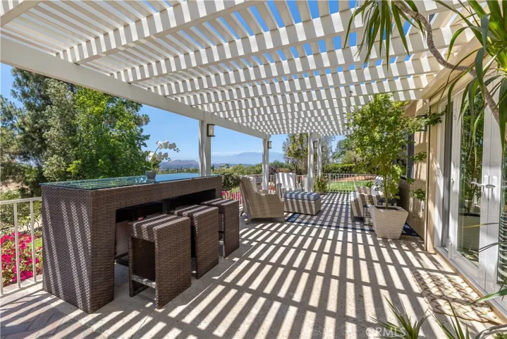 Wonderful Large Gated Patio Area off your Family Room with Newer Alumawood Covering.