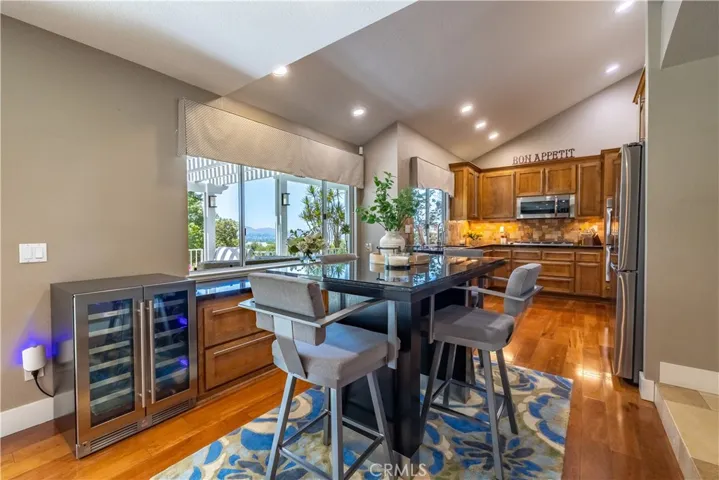 Kitchen Eating Area with Views and Custom Cabinets