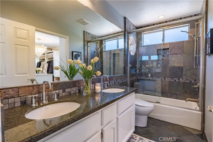 Large Bathroom with Double Sinks and Bathtub