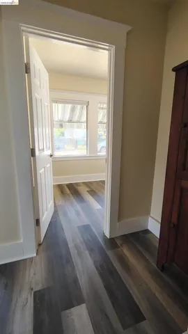 Warm neutral wall tones with crisp white trim throughout