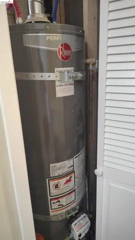 Rheem Performance water heater with visible plumbing connections