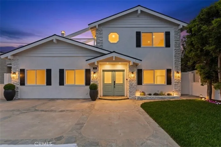 Front of Home with 3 Car Driveway