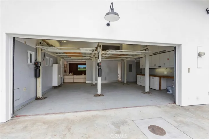 Original Photo Original Photo with Sliding Wall OPEN to Flex Space/Bonus Room - Storage Attic above Flex Room w/drop down Stairs