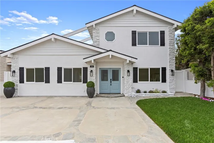Front of House w/ 3 Car Driveway