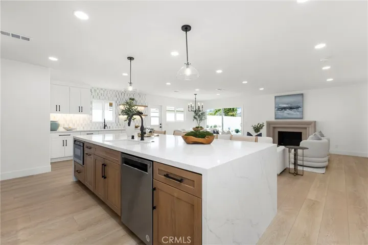 Original Photo - No AI edit of Fireplace - Massive Island with Sink