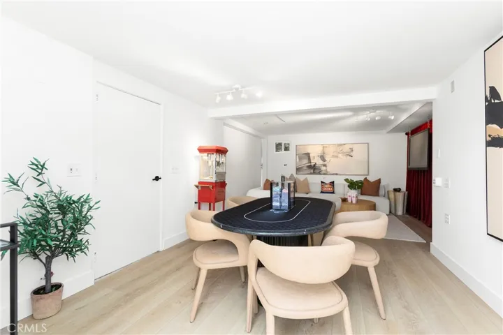 Original Photo - Flex Space/Bonus Room off Garage - Sliding Wall and Separate Door to Garage are CLOSED OFF to Garage in photo (Potential ADU?)