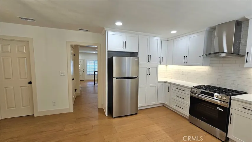 Kitchen with view to front door
