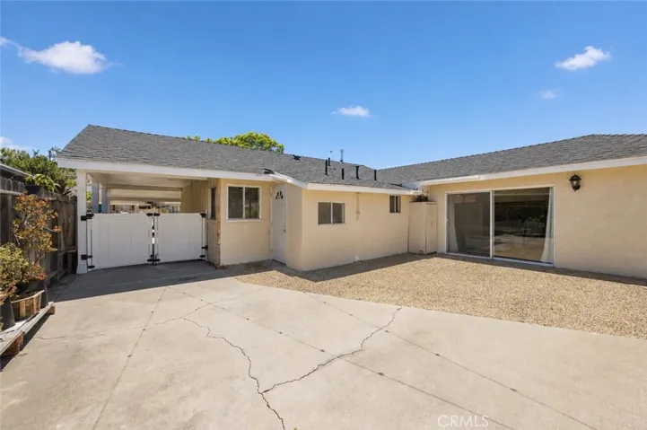 carport + detached garage + extended driveway