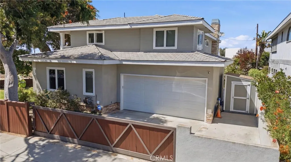 Attached, oversized 2-car garage with privacy gate. Attached, oversized 2-car garage with privacy gate.