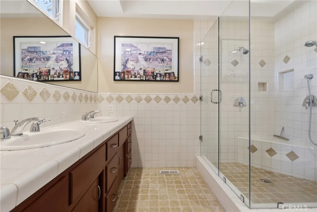 Office ensuite bath - step-in shower, dual sinks. Office ensuite bath - step-in shower, dual sinks.
