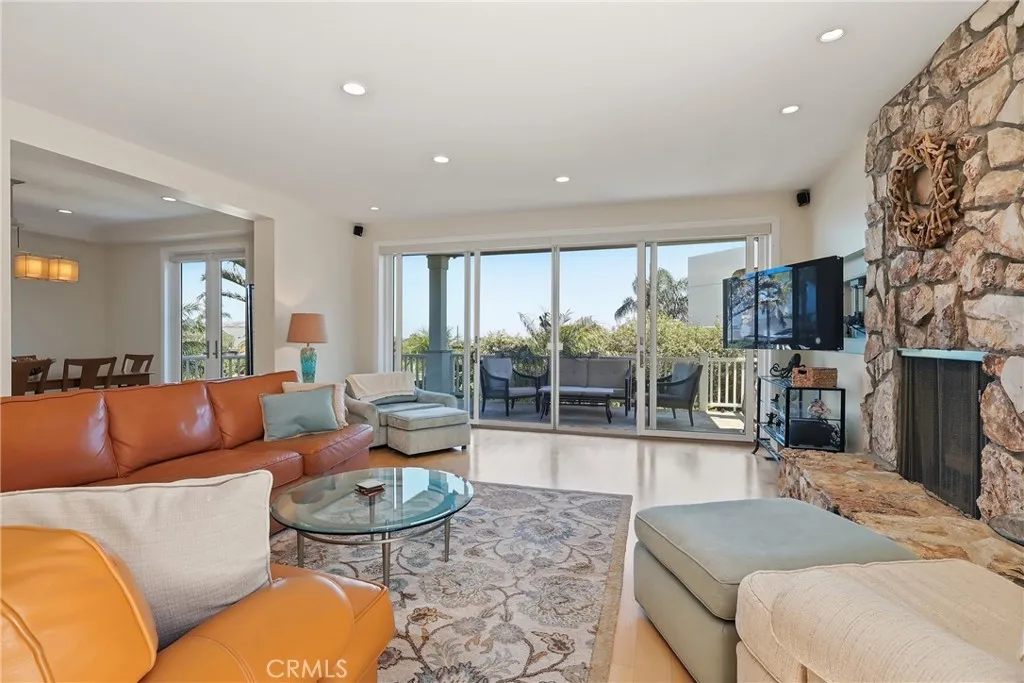 Open-concept floorplan - living room adjacent to formal dining and kitchen. Open-concept floorplan - living room adjacent to formal dining and kitchen.
